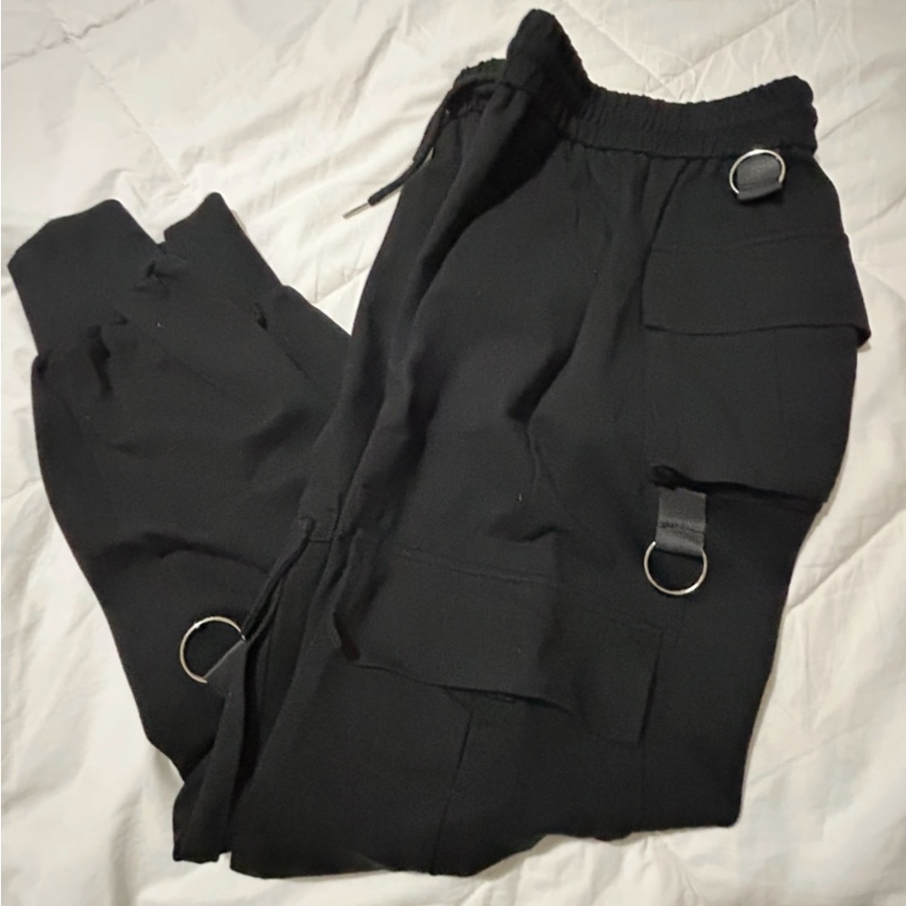 The Kript pants Wear Side Flap Pocket Tape Panel Cargo Pants.